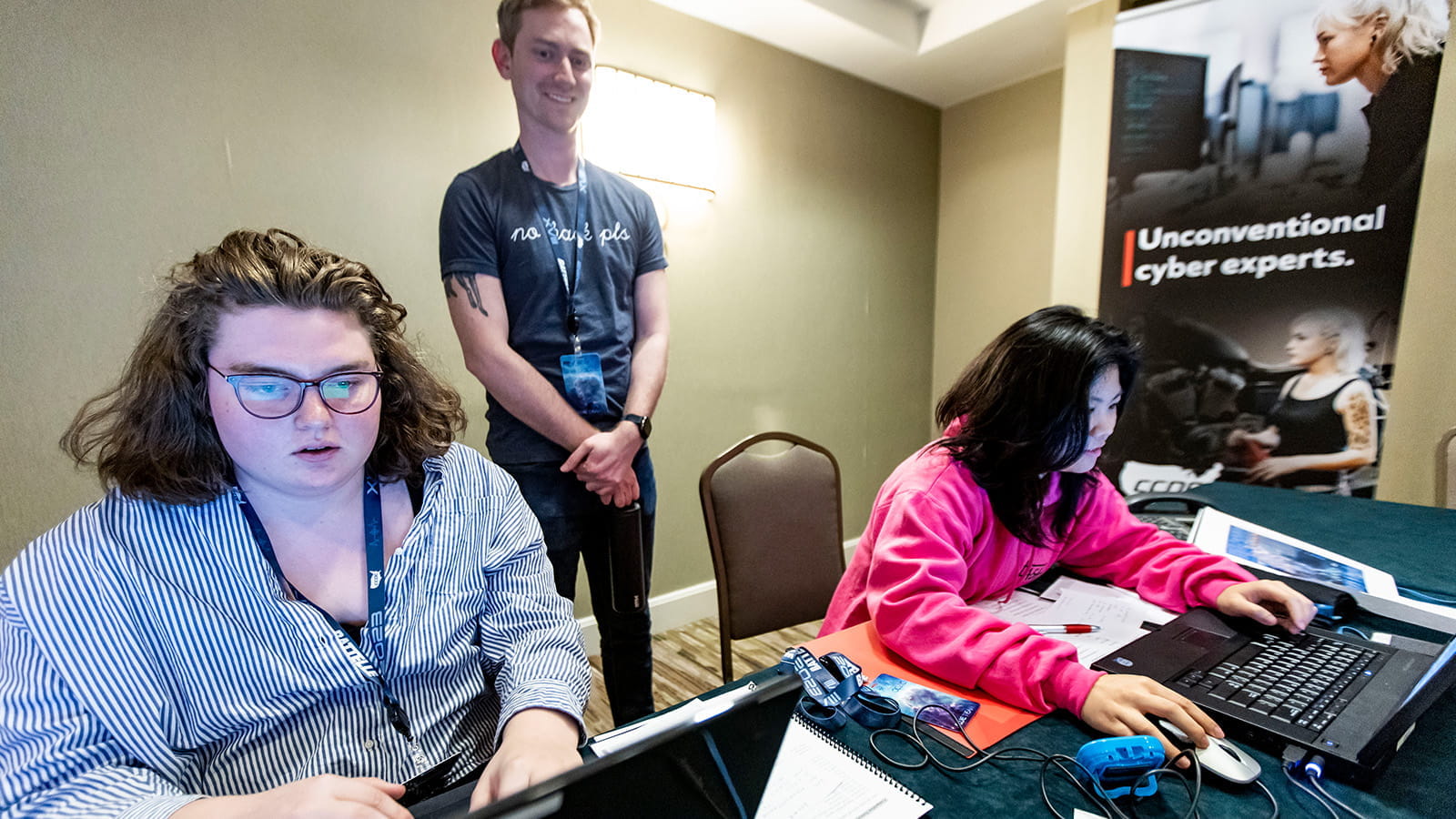 students working on laptop