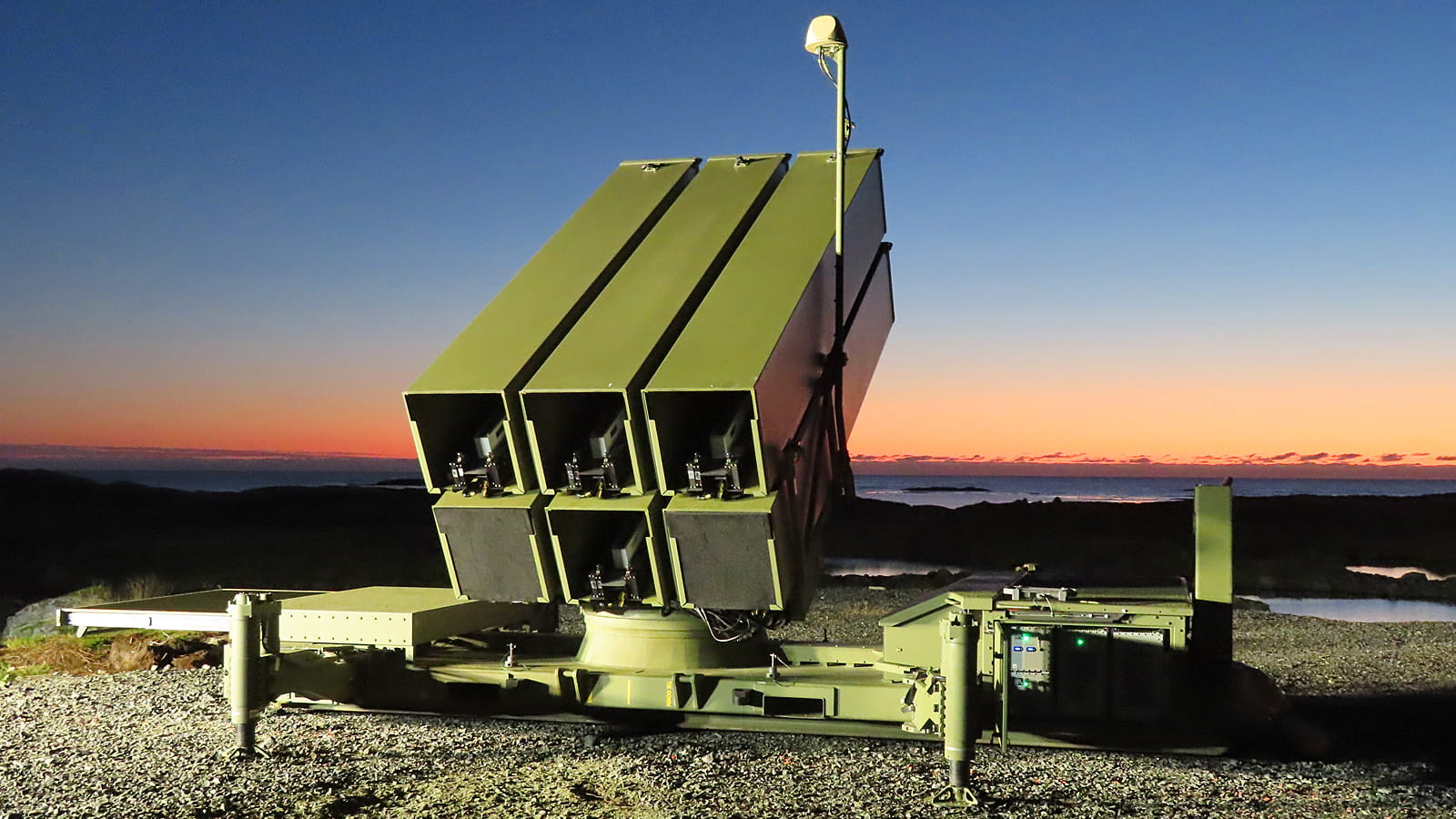 The NASAMS air defense system includes a multi-missile canister for air base defense.