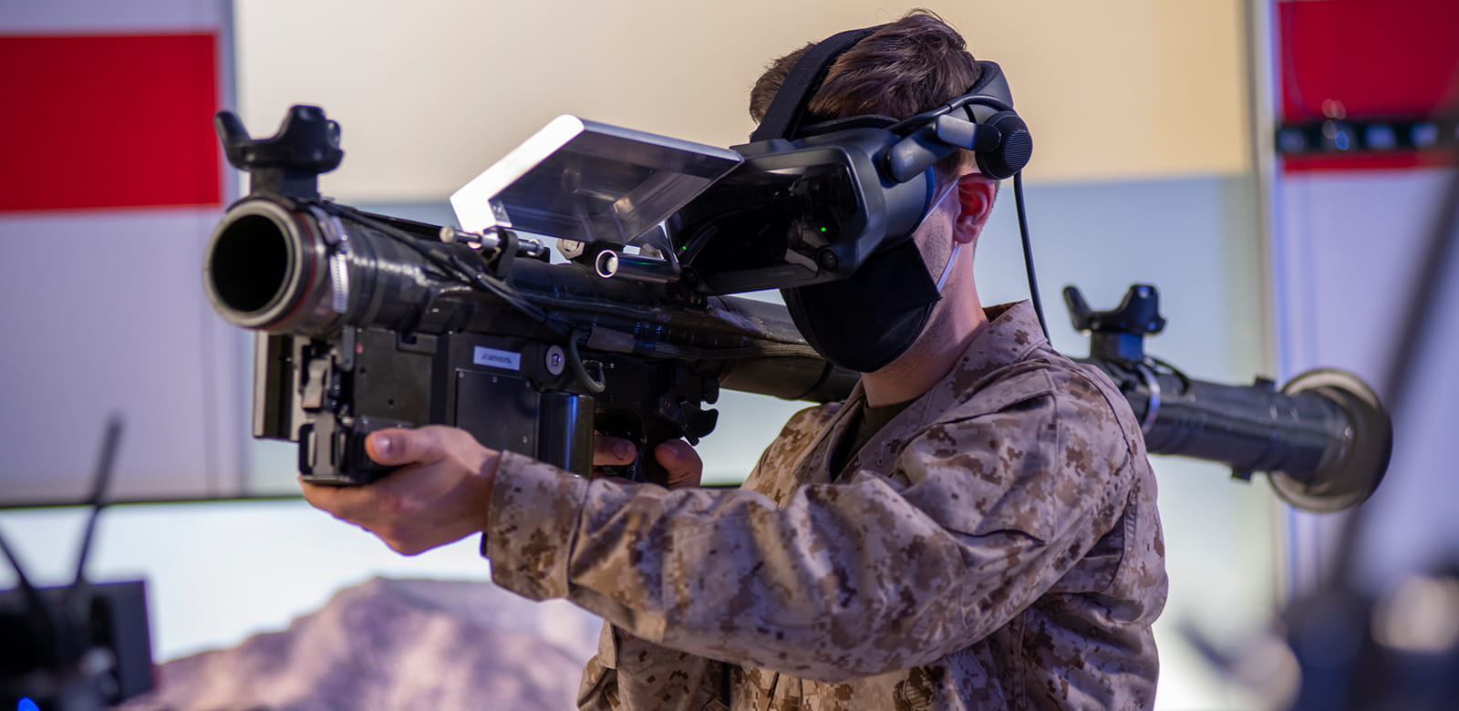 Soldier holds Stinger Virtual Trainer in demo