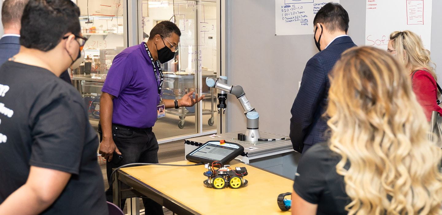 An instructor does a demo at Pima JTED.