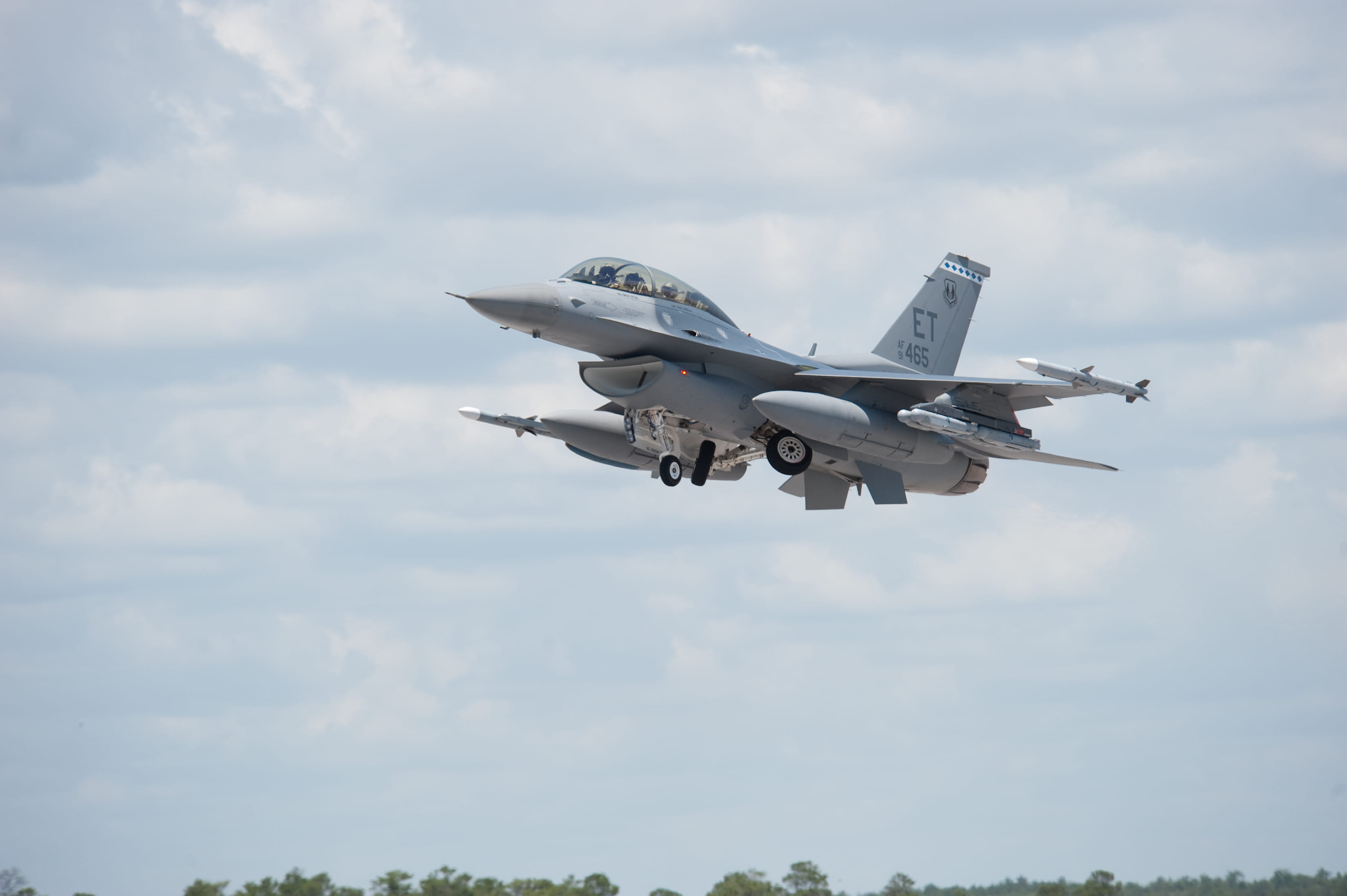 An F-16 Fighting Falcon takes off in a StormBreaker smart weapon captive flight test.
