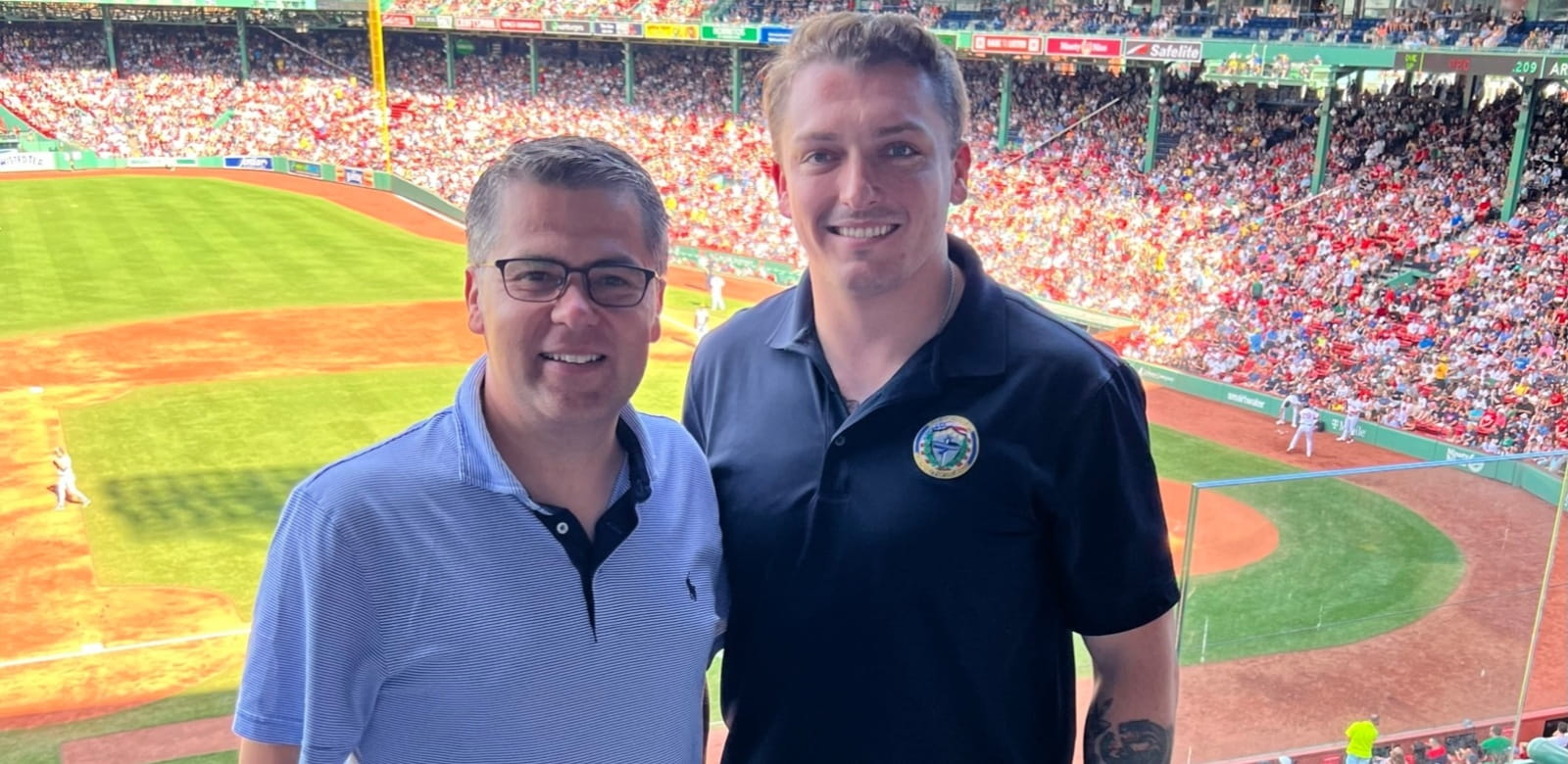 Randy Bumps, global corporate social responsibility lead for Raytheon Technologies, hosted Kenneth Sheehan and other student veterans at a Boston Red Sox game. (Photo: Randy Bumps)