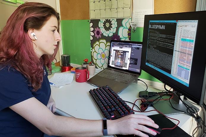 Maggie Gates, University of Virginia cyber defense team captain, works with the BLUESPAWN tool.