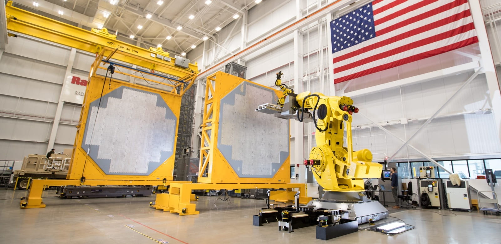 A robot assembles a SPY-6 air and missile defense radar inside the Radar Development Facility at Raytheon Missiles & Defense.
