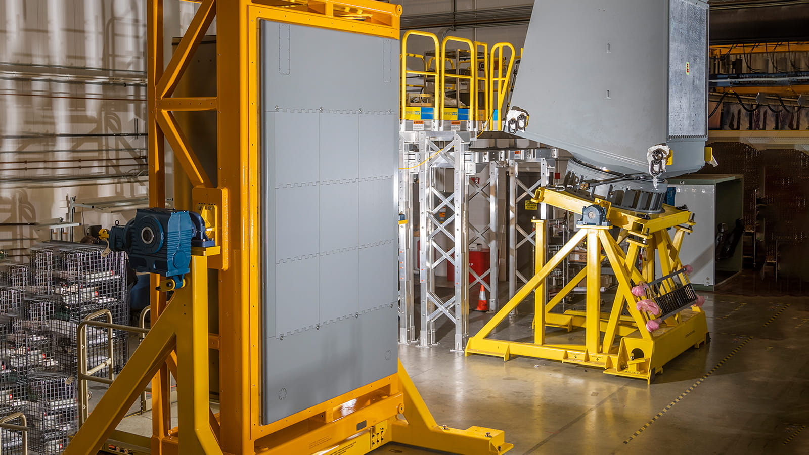 When three SPY-6(V)3 radar arrays (left) are combined, they provide 360 degree coverage for aircraft carriers, like the future-U.S.S. John F. Kennedy.