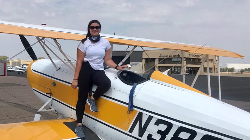 In her spare time, Kealey Maddalena flies a Great Lakes Biplane while doing Aerobatic Flight Training in Chandler, Arizona. Maddalena’s aviation background helped her land a key role in the HAWC missile program.