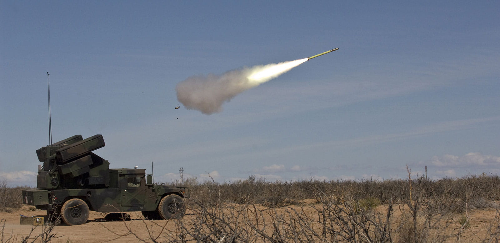 Stinger missile being deployed from a launcher on top of a vehicle