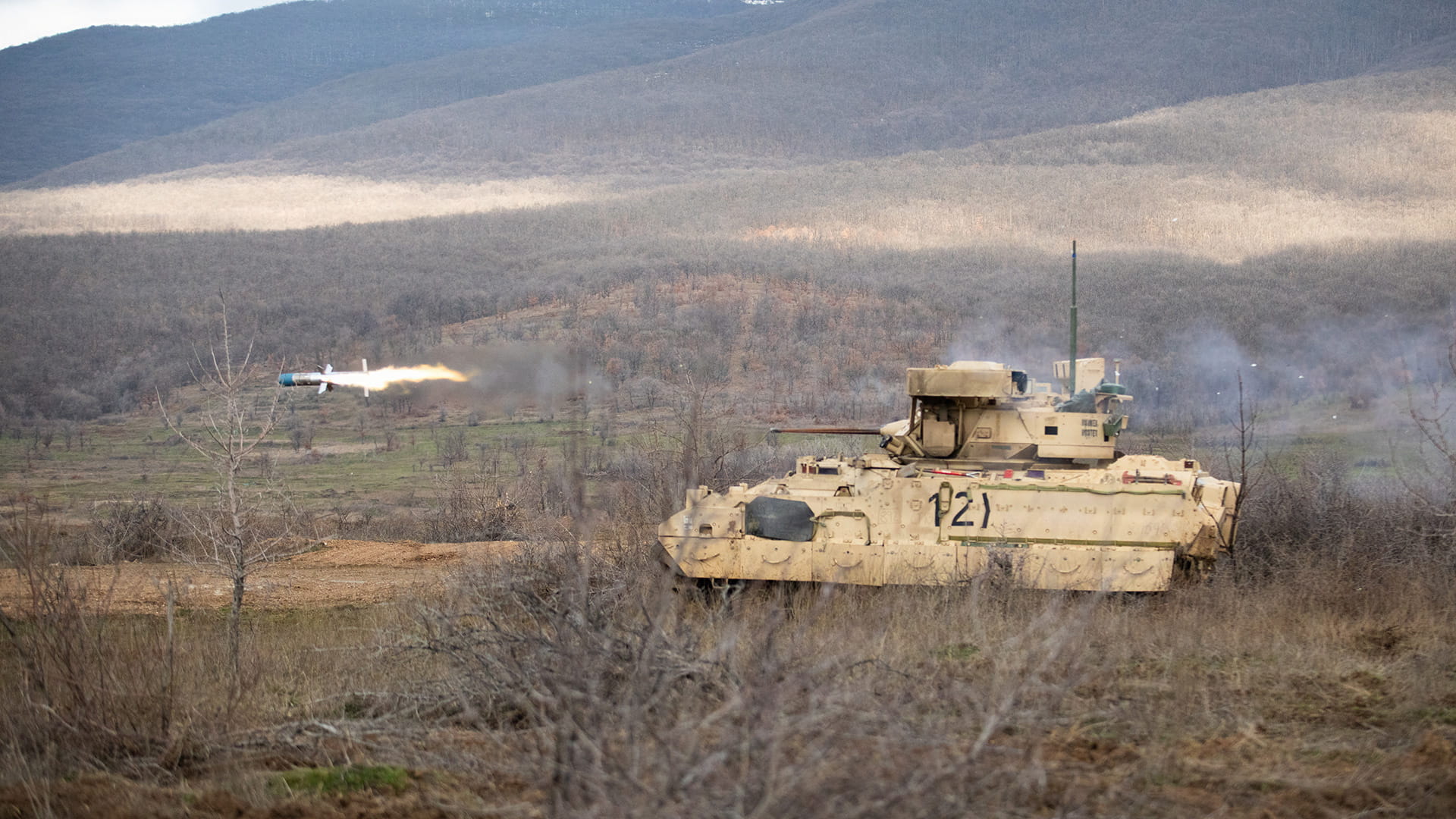 TOW missile fired from a tank