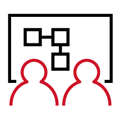 An infographic icon of people at a computer.