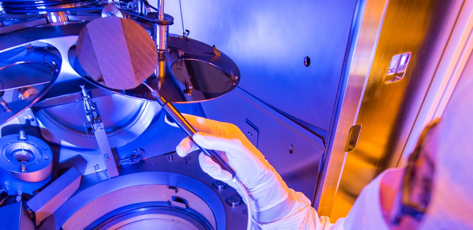 A gallium nitride semiconductor is examined in the lab.