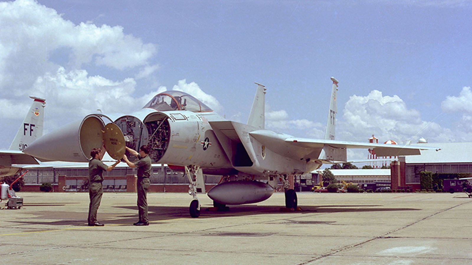 An F-15 Eagle with open radome revealing the APG-63 radar.