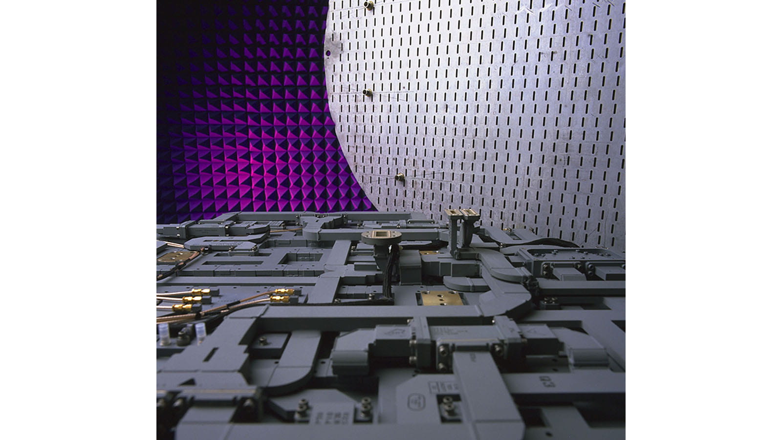 Gate array waveguide (foreground) and slotted plate antenna (background).