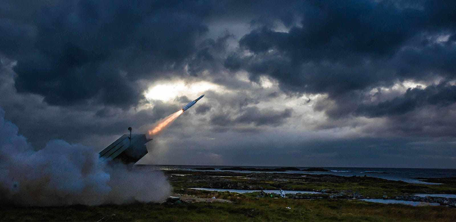 An AMRAAM®-Extended Range missile is fired from a NASAMS™ launcher and successfully engages and destroys a target drone during an international flight test at the Andoya Space Center in Norway. The test validated the complete system, including the AMRAAM-ER missile, NASAMS system, Sentinel radar and Kongsberg’s Fire Distribution Center.