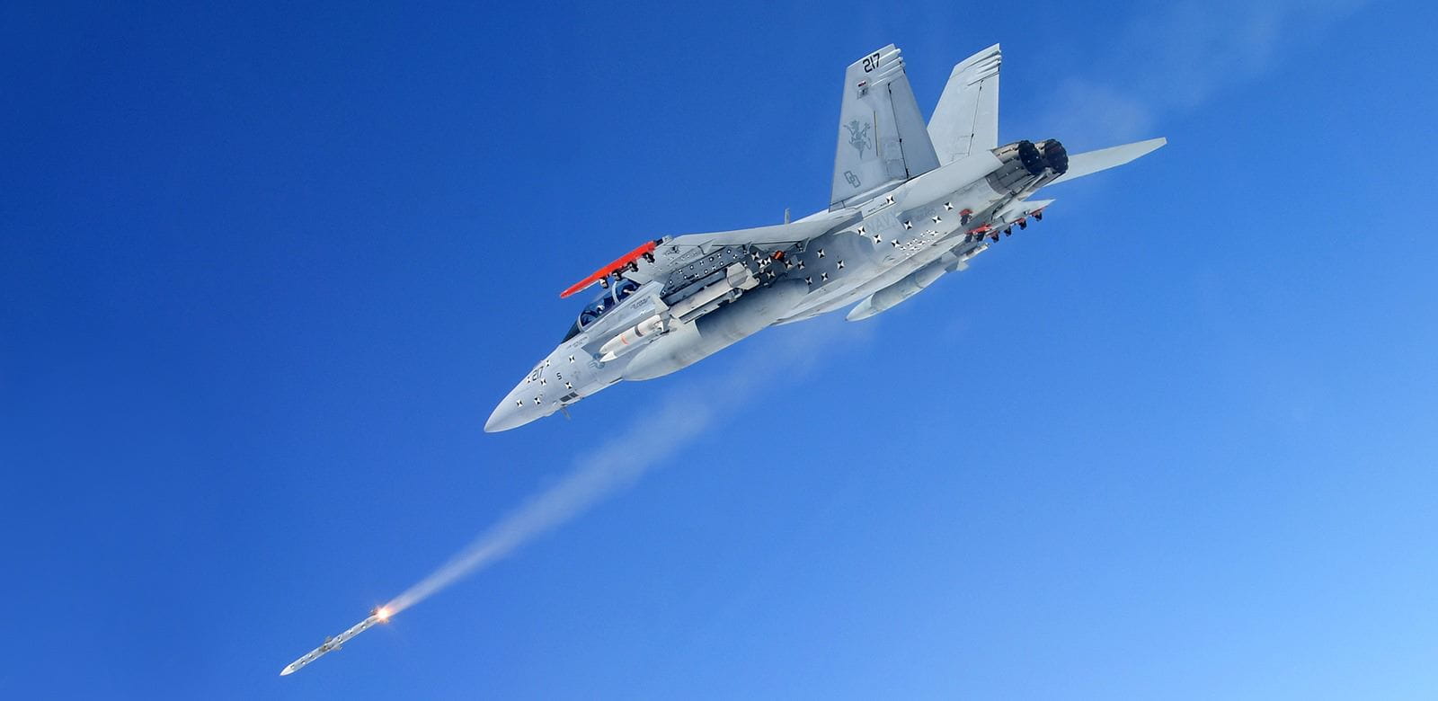An AMRAAM F3R missile (AIM-120D-3) is launched from a F/A-18F Super Hornet over the Point Mugu Sea Range during a test.