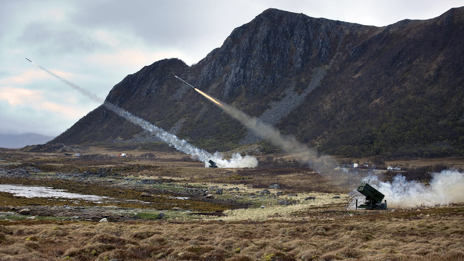 Missiles fire from NASAMS launcher.