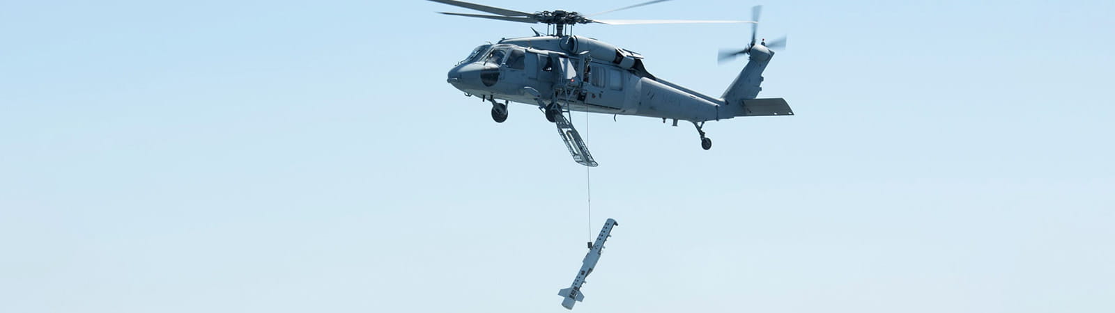 Helicopter in flight with AN/ASQ-235