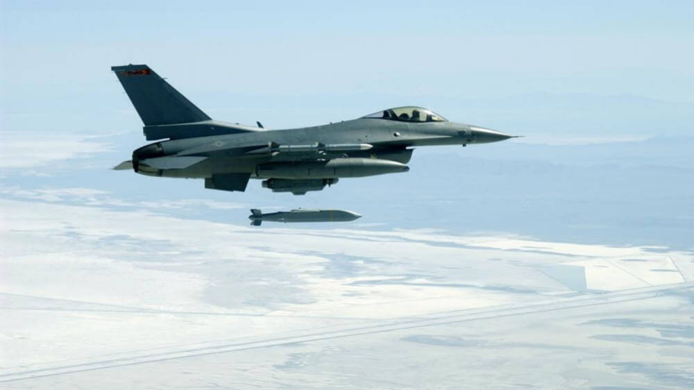 An F-16C Fighting Falcon releases an AGM-154 Joint Standoff Weapon over the Utah Test and Training Range. (Photo: U.S. Air Force)