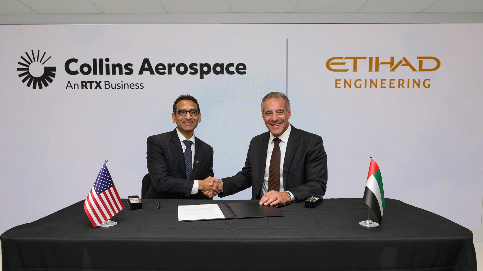 Collins Aerospace President of Advanced Structures Ajay Mahajan and Etihad Engineering CEO Daniel Hoffmann sign nacelle MRO joint venture